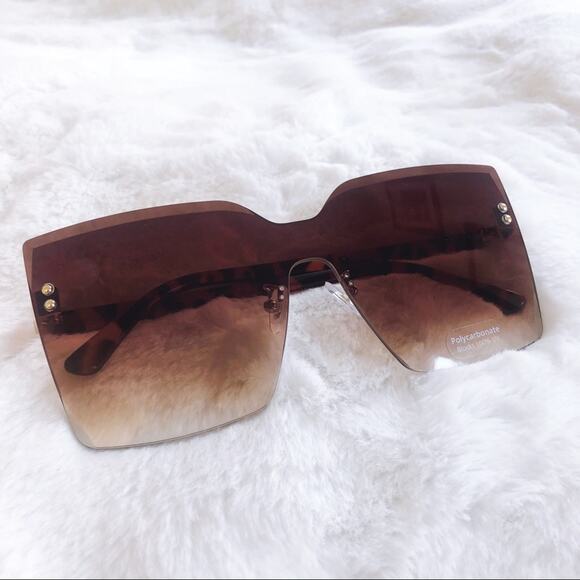Dana Brown Rimless Oversized Cat Eye Sunglasses - Picture 3 of 9